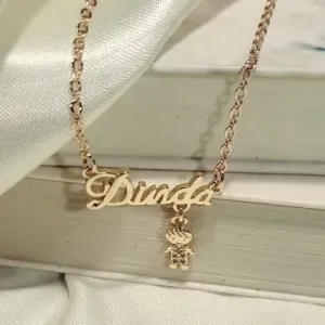 colar ouro escrita dinda menino pendurado p