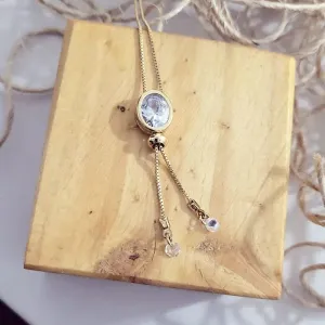 colar ouro gravata ponto de luz oval cristal
