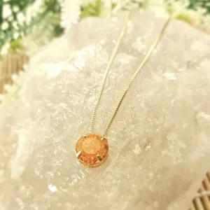 Colar ouro ponto de luz laranja