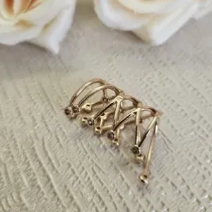 piercing ouro comprido trama pontos zirconias