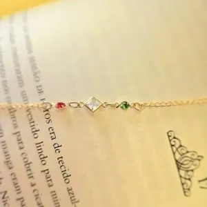 pulseira ouro losango cristal com 2 pontos zircônias color