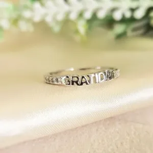 anel rodio gratidão cravejado