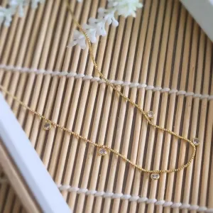 colar ouro com pontos de luz cristal