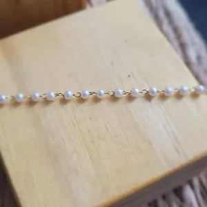 pulseira ouro perola pequena