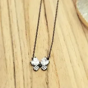colar rodio negro borboleta metade cristal metade zirconias