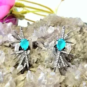 brinco rodio negro ear cuff leque zirconias meio gota verde