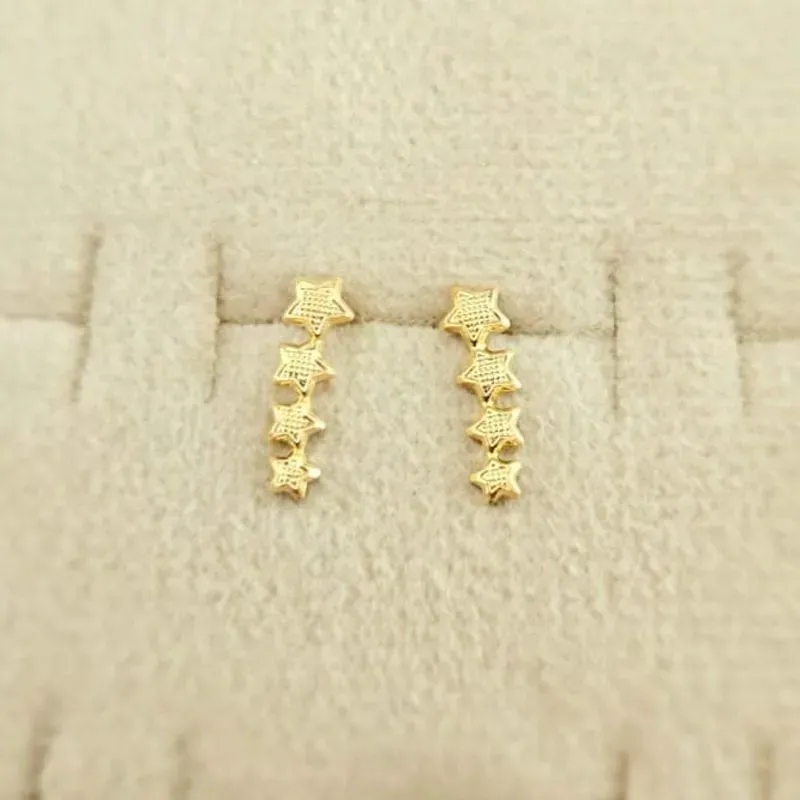 brinco ouro com 4 estrelas trabalhadas