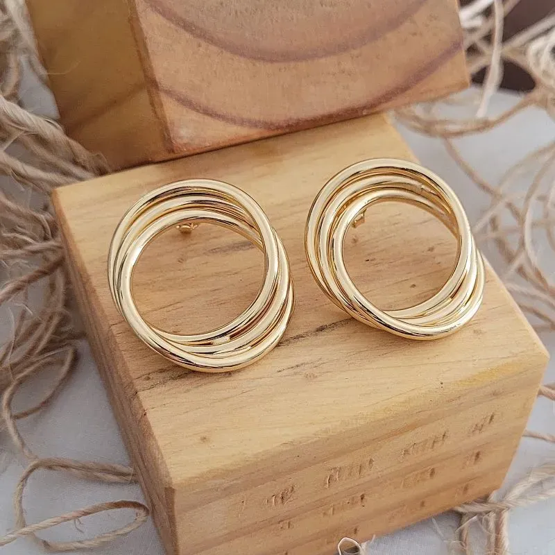 brinco ouro triplo circulo