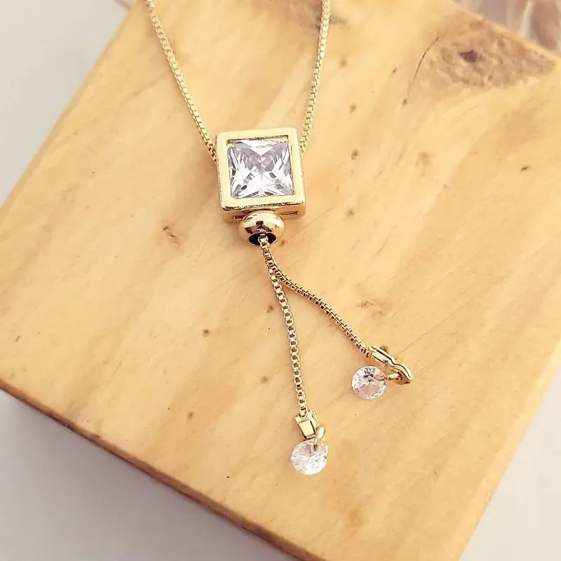 colar ouro gravata ponto de luz quadrado cristal