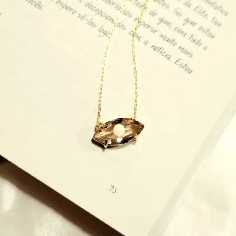 colar ouro olho greco cristal nude