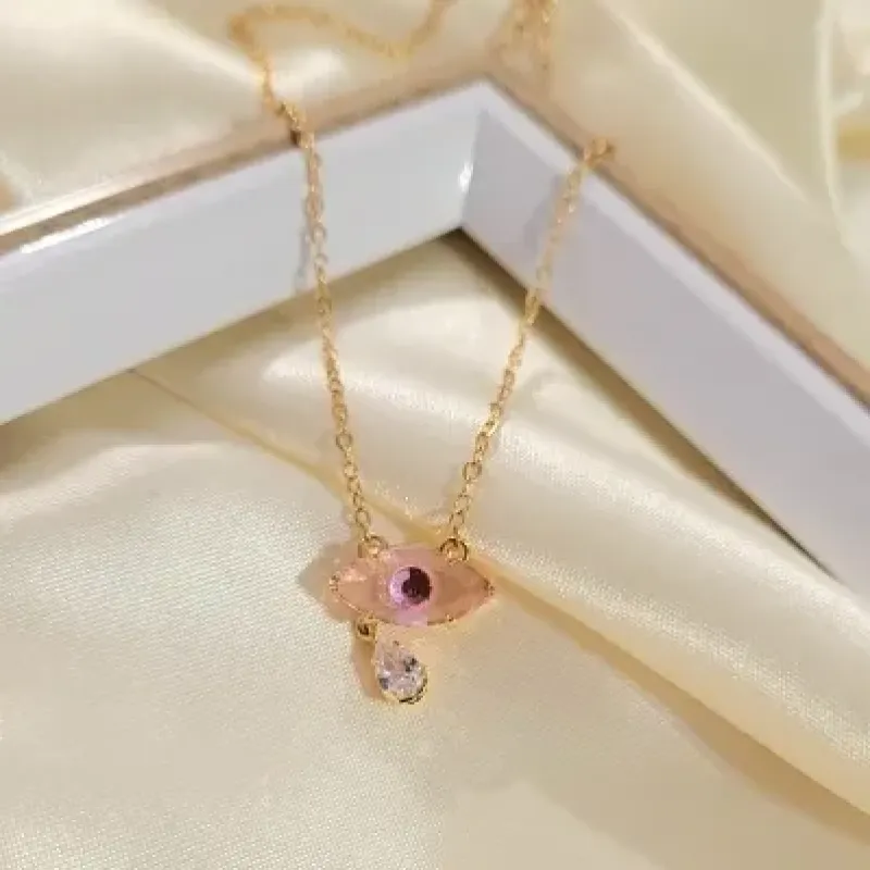 colar ouro olho grego cristal rosa com gotinha pendurada