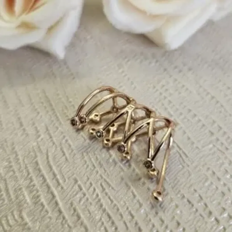 piercing ouro comprido trama pontos zirconias