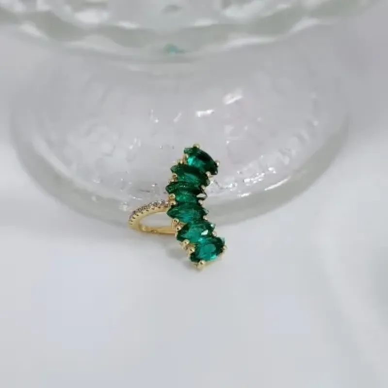 piercing ouro fileira 5 navetes verdes