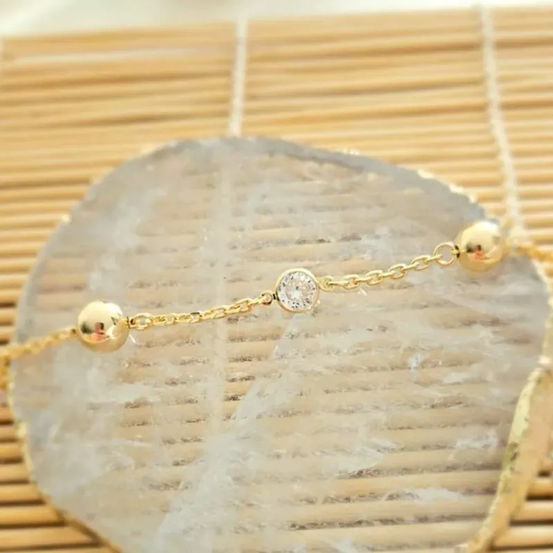 pulseira ouro bolas e pedras cristais intercaladas