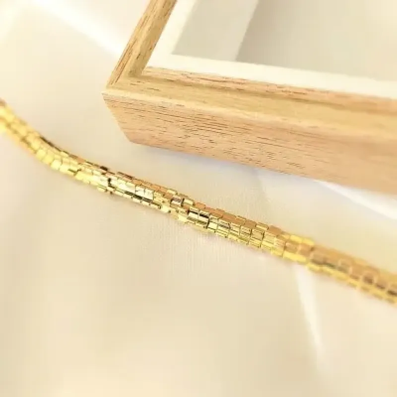 pulseira ouro canutos assimétricos