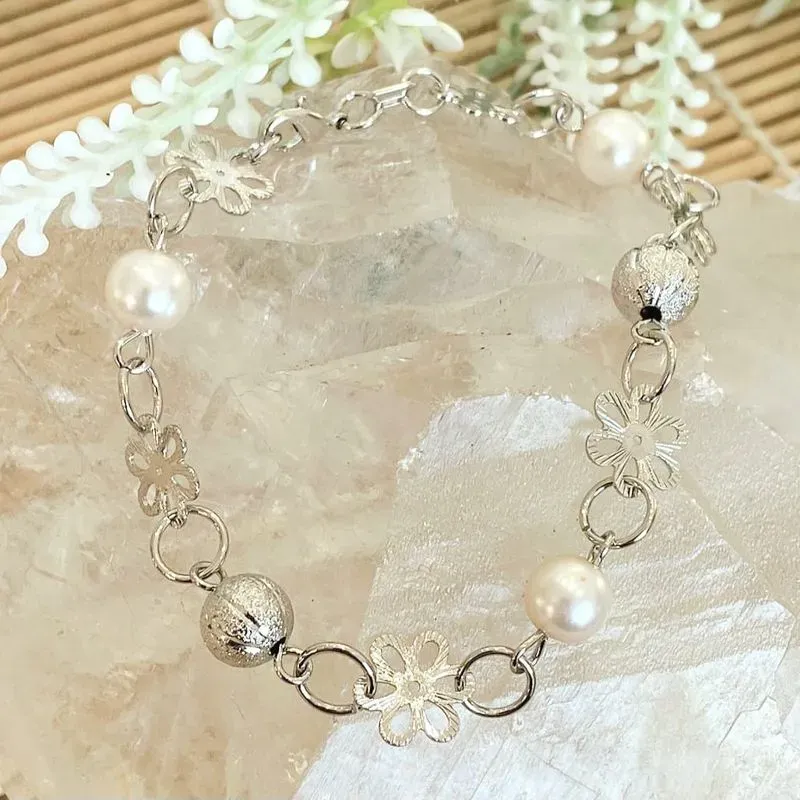 pulseira rodio flor perola e bolas trabalhadas intercaladas