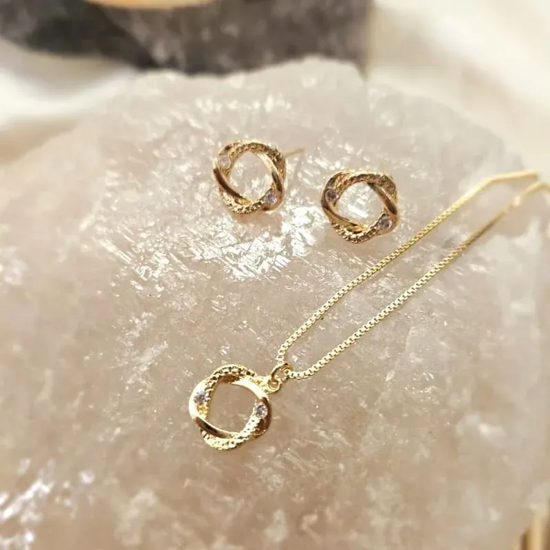 conjunto ouro mandala entrelaçada cravejada