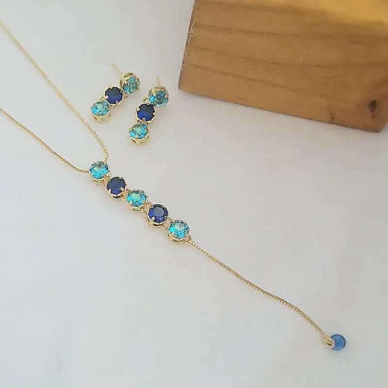 conjunto ouro pedra azul claro e azul escuro pendurado