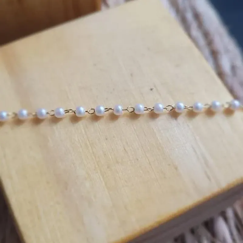 pulseira ouro perola pequena