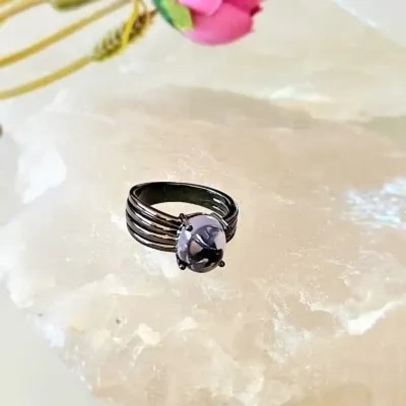 anel ródio negro cristal oval ametista com linhas lisas