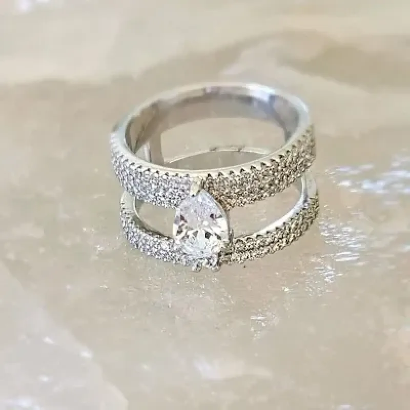 anel rodio duplo fias zircônias com meio 1 gota cristal