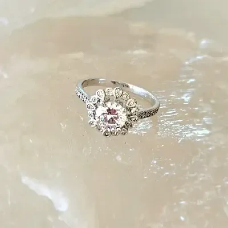 anel rodio solitario flor zirconias