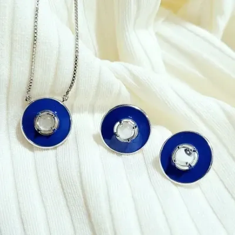 conjunto rodio circulo esmaltado azul com pedra cristal azul