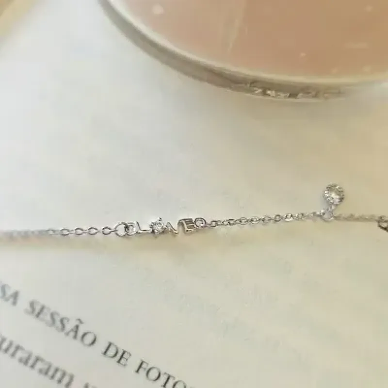 pulseira rodio love com ponto de luz pendurado