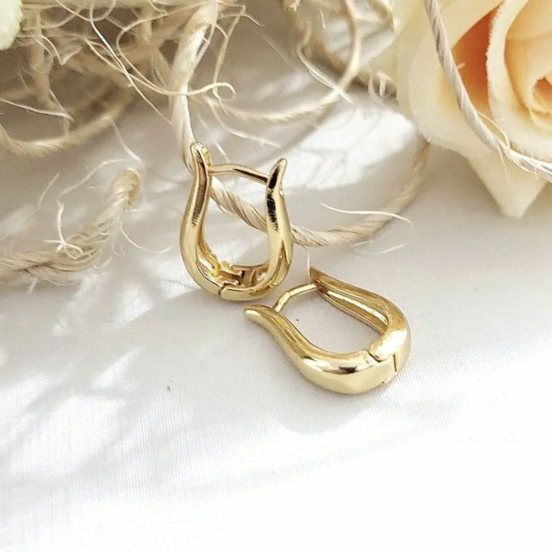brinco ouro argola oval lisa média