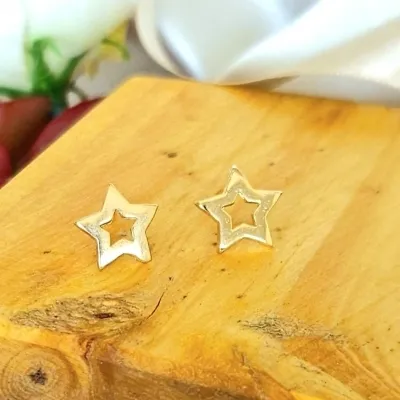 brinco ouro estrela vazada médio com borda grossa