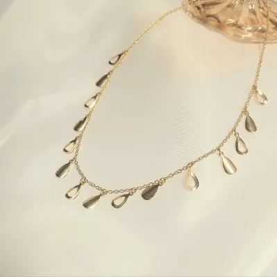 colar choker ouro gotas lisas e vazadas intercaladas