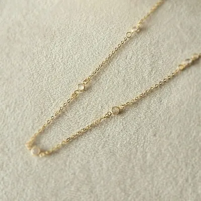 colar ouro choker ponto de luz cristal