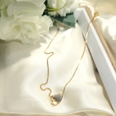 colar ouro coração liso com estrelinha pendurada