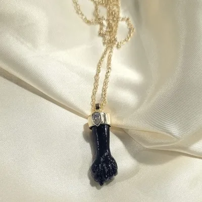 colar ouro corrente portuguesa figa de baquelite preto