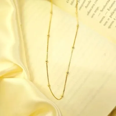 colar ouro longo bolinhas lisas espaçadas
