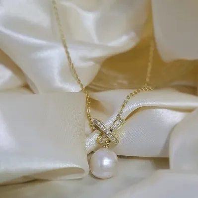colar ouro X de zircônias com pérola