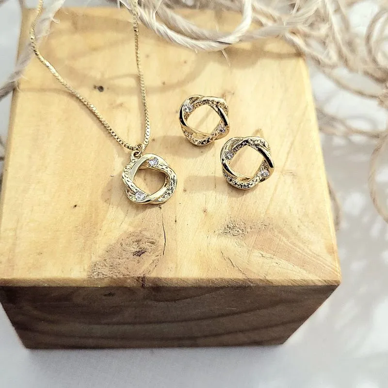 conjunto ouro mandala entrelaçada cravejada
