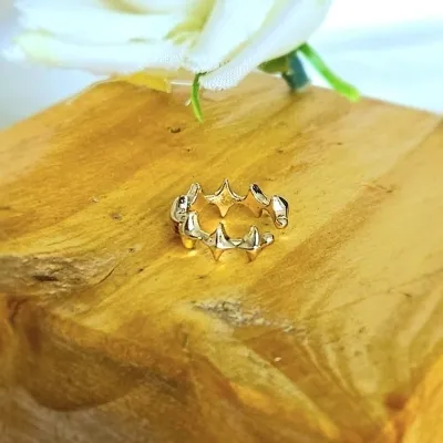 piercing ouro estrelinhas 4 pontas ligadas