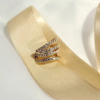 piercing ouro meio 4 filas zirconias entrelaçadas