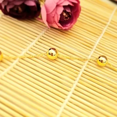 Pulseira ouro bolas lisas