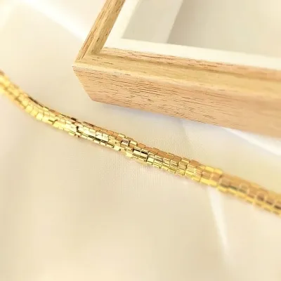 pulseira ouro canutos assimétricos