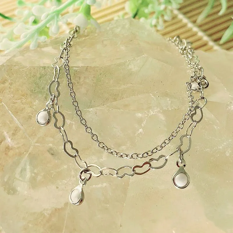 pulseira rodio dupla perolas com pulseira de coração e elo português