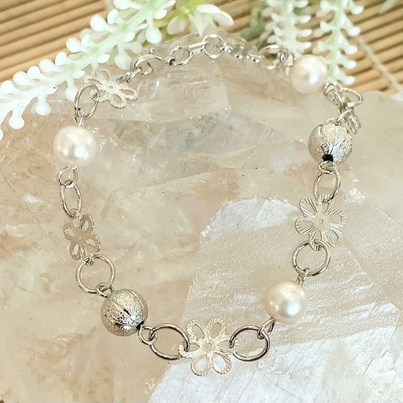 pulseira rodio flor perola e bolas trabalhadas intercaladas