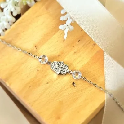 pulseira rodio mao de fatima cravejada com 2 bolinhas cristal