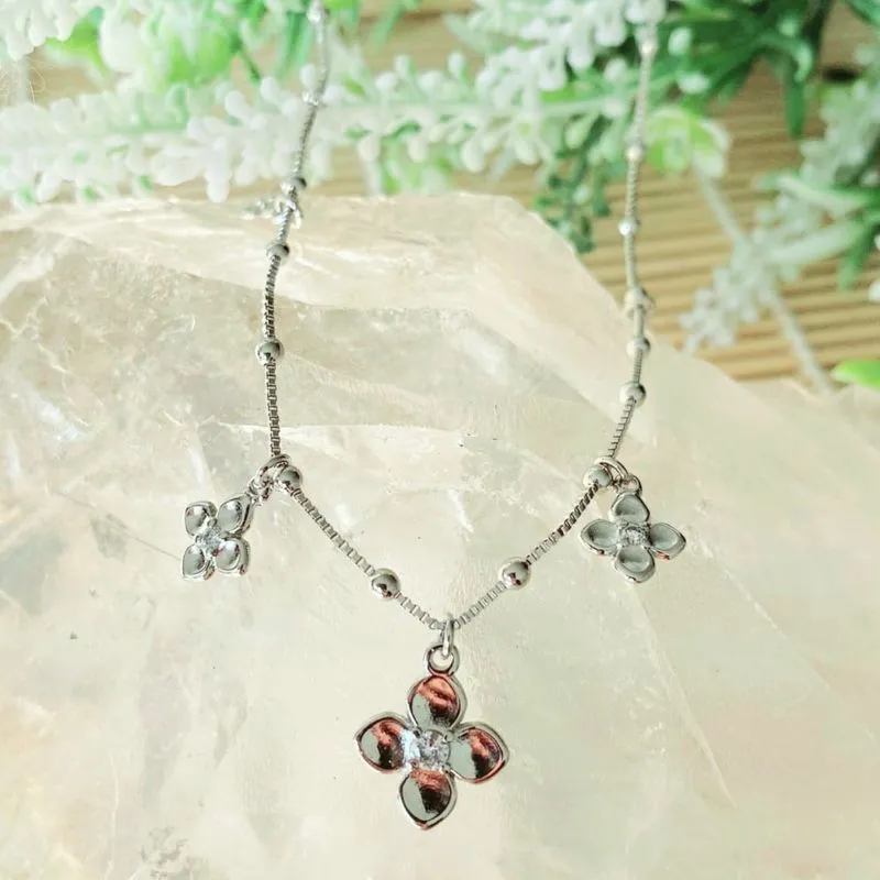 colar rodio choker flor ponto de luz cristal no meio