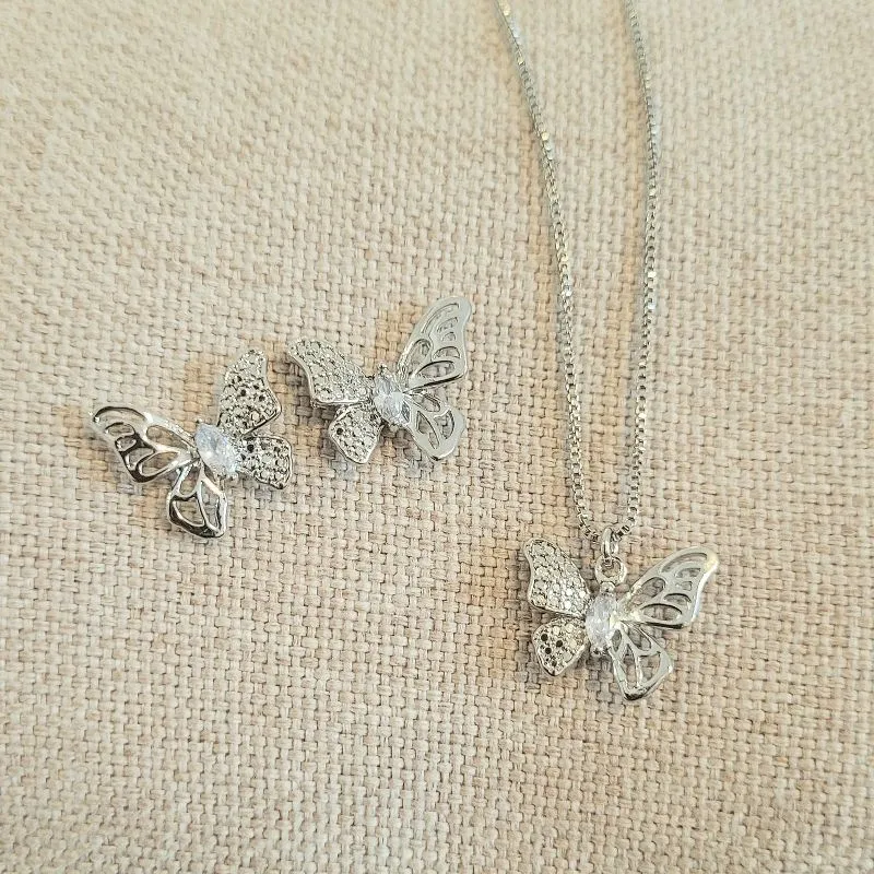 conjunto rodio borboleta com ponto de luz no meio