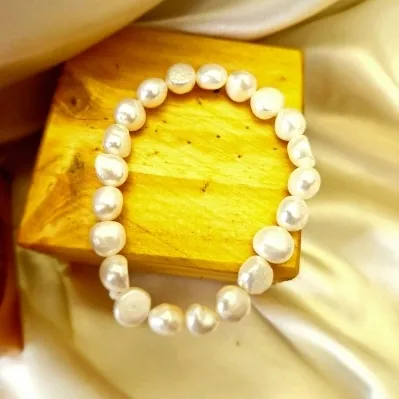 pulseira perolas medias de agua doce