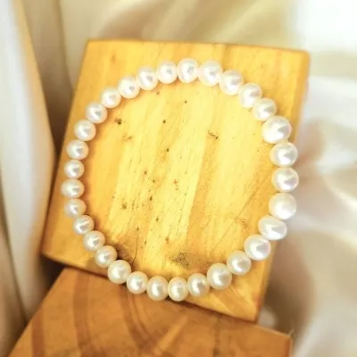 pulseira perolas medias de agua doce