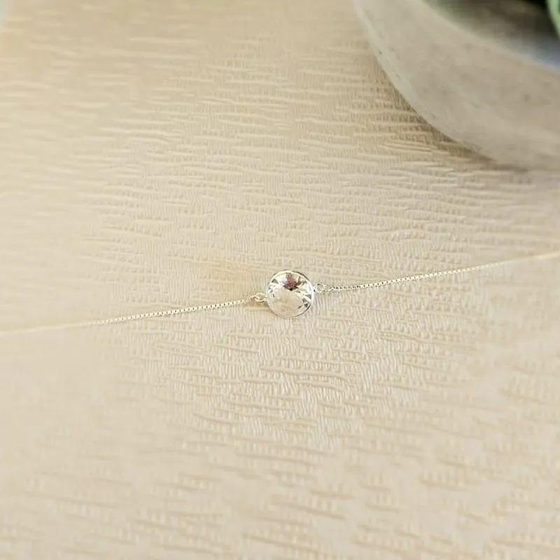 pulseira prata ponto de luz cristal com borda