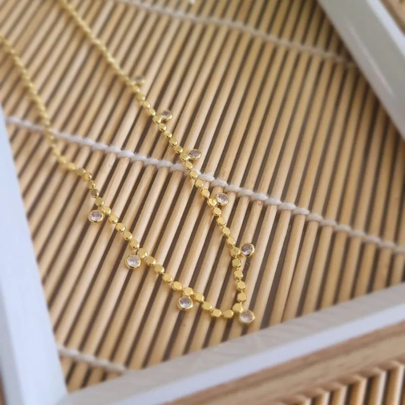colar ouro choker bolinha chapada com pontos de luz cristal